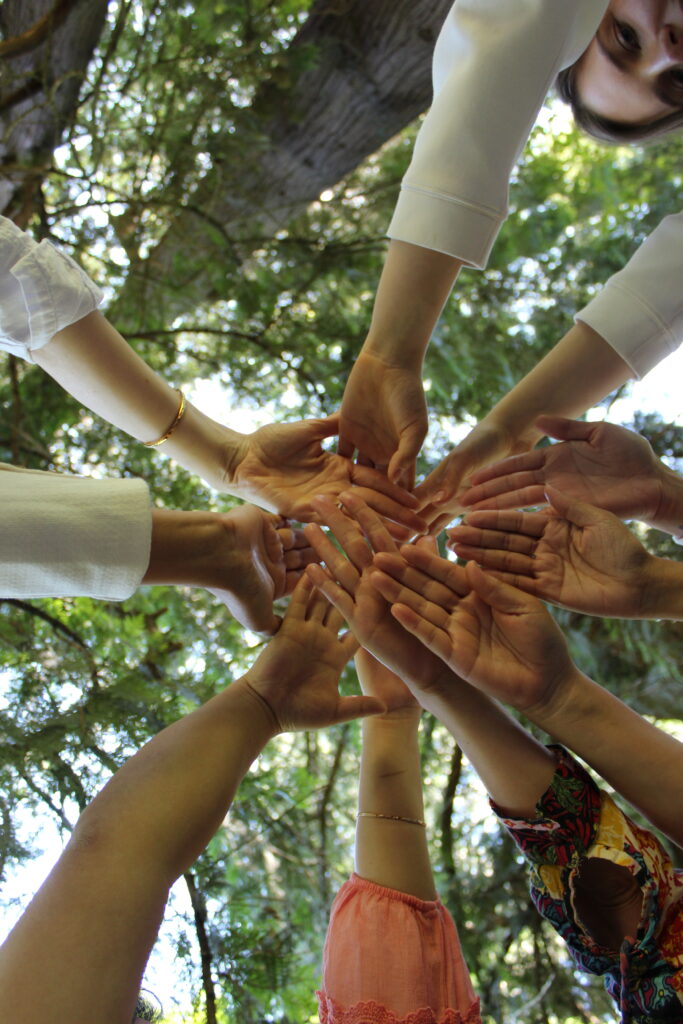 Group of hands meeting in the middle ADHD assessment for women